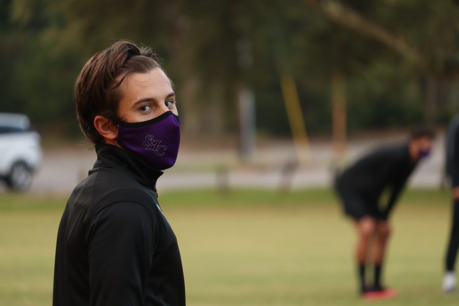 Men’s Soccer Player Joao Amaral following the new mask guidelines during practice. Photo By: Sacha Ducreux