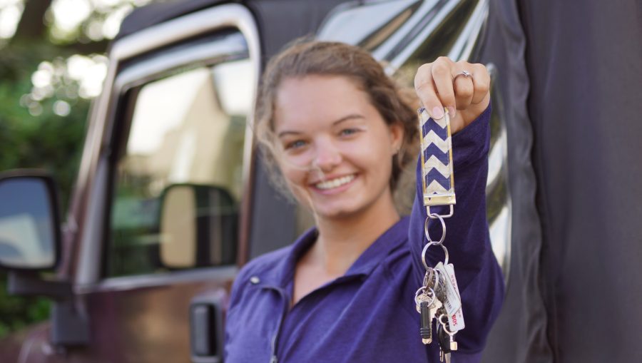 Commuter student shows off car keys. 