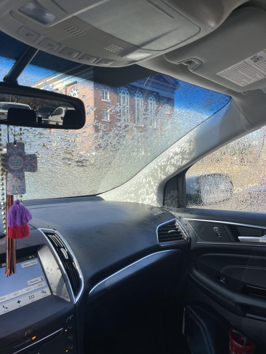 A layer of ice covering a students windshield