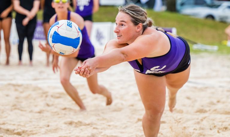 Sandy Badgers Wrap Up Beach Bash with Pair of Wins