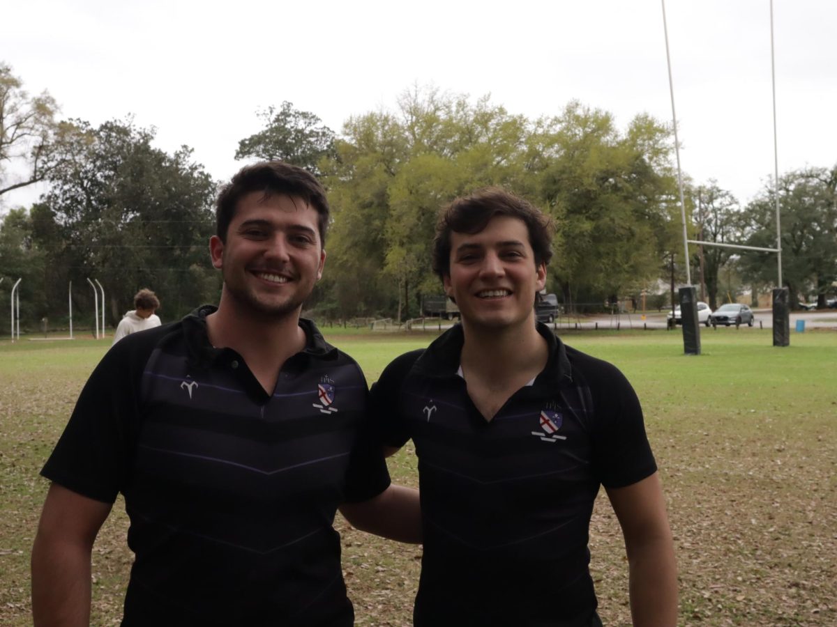 Senior Eric Andersen and Junior Santiago Day in their rugby uniforms after the tournament
